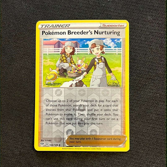 Pokémon Breeder’s Nurturing 166/189 - Trainer reverse holo uncommon